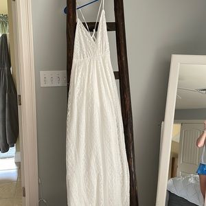 White maxi summer dress never worn with spaghetti straps. Ties in back size Med